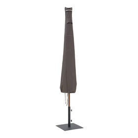 Classic Accessories Ravenna 11ft umbrella cover protecting a patio umbrella from weather