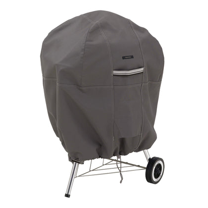 Classic Accessories Ravenna cover on a 26.5-inch kettle grill protects from weather