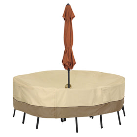 Classic Accessories Veranda round table cover with umbrella hole protects outdoor furniture.