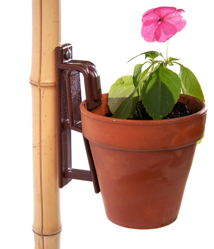 Clever Gardener Pot Latch Hangers securely display terra cotta pots on wood surfaces
