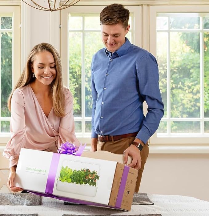Click & Grow grow light in action illuminating herb garden