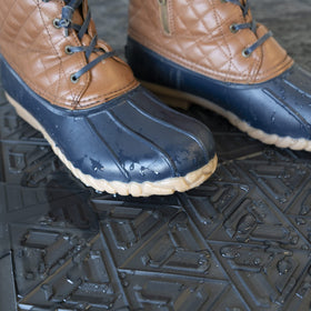 CLIMATEX easy-clean outdoor mat rinses clean with a hose after use