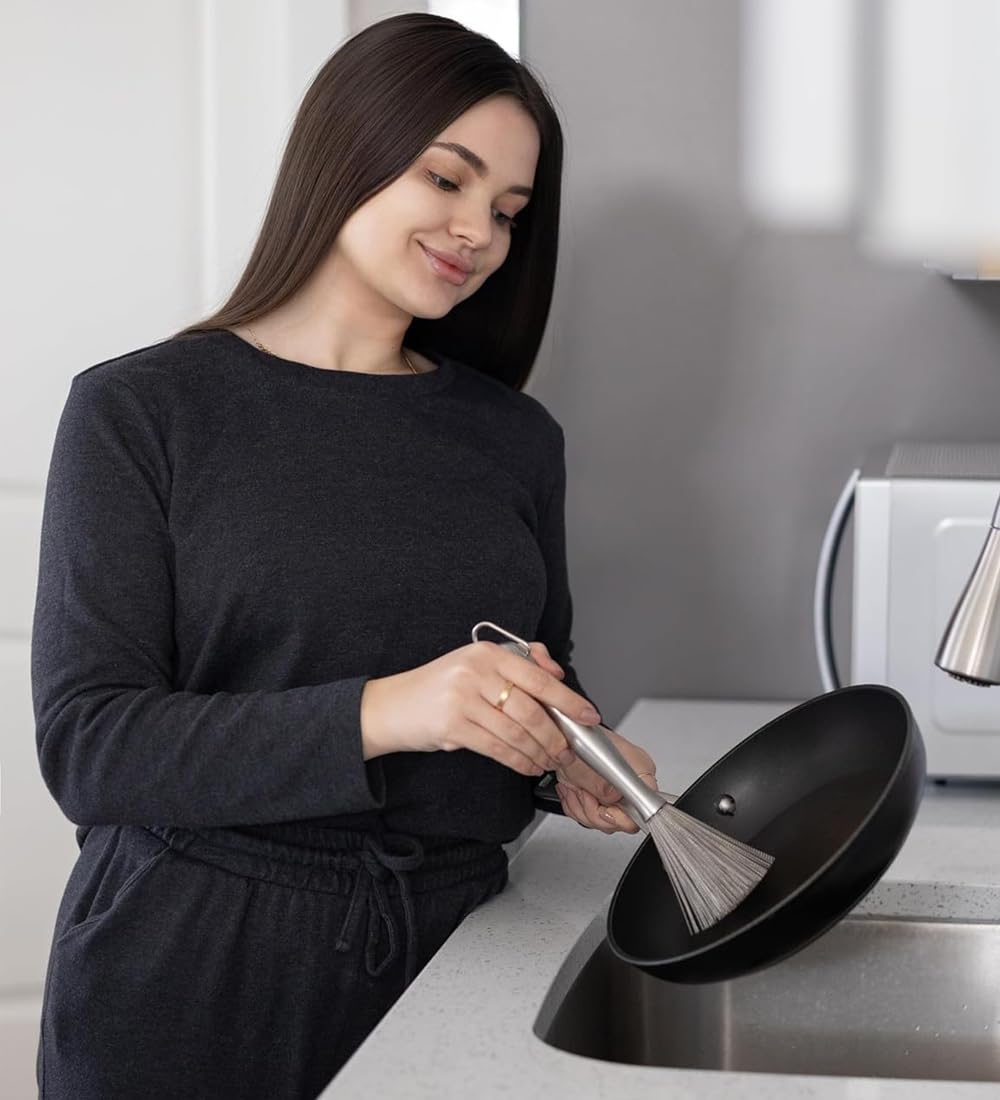 CloudMades dish brush clears grease on grills and pans effectively.