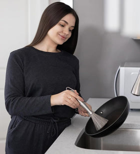 CloudMades dish brush clears grease on grills and pans effectively.