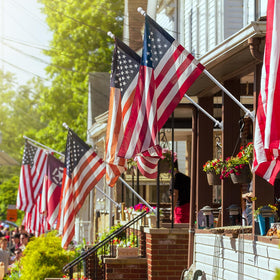 Cogardenshower garage and deck display with patriotic ambiance.