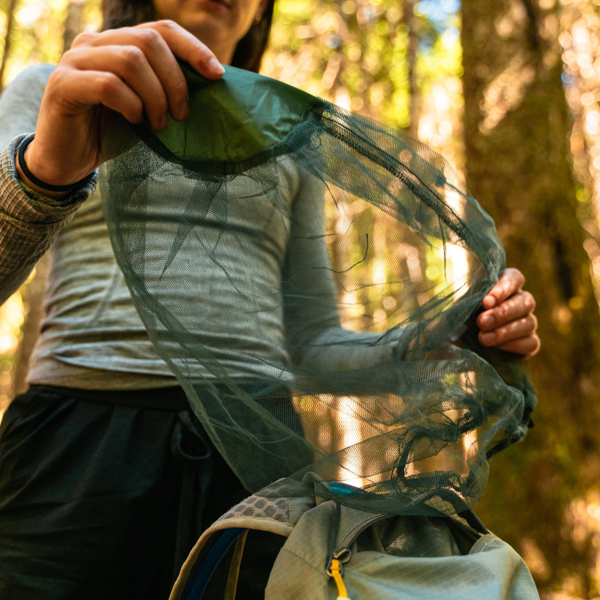 Coghlan's Mosquito Head Net fits over headgear for a comfortable, bug-free hike.