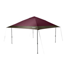 Coleman Oasis canopy center hub setup showcases quick assembly for shade.
