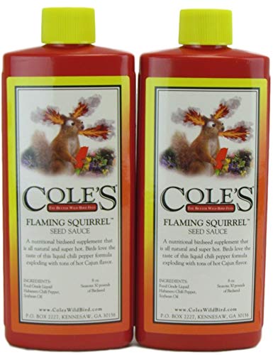 Cole's Flaming Squirrel Bird Food Additive 8oz bottle attracts birds and deters squirrels.