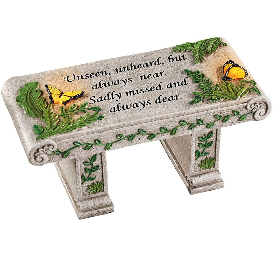 Collections Etc solar powered outdoor memorial bench glowing at night