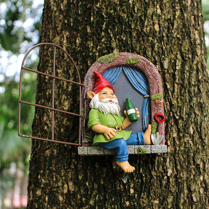 Colomix Gnome Tree Hugger peeking on a tree adds whimsical curb appeal to outdoor spaces.