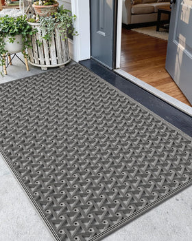 Color&Geometry door mat outside entrance with drainage traps dirt and moisture at the doorway