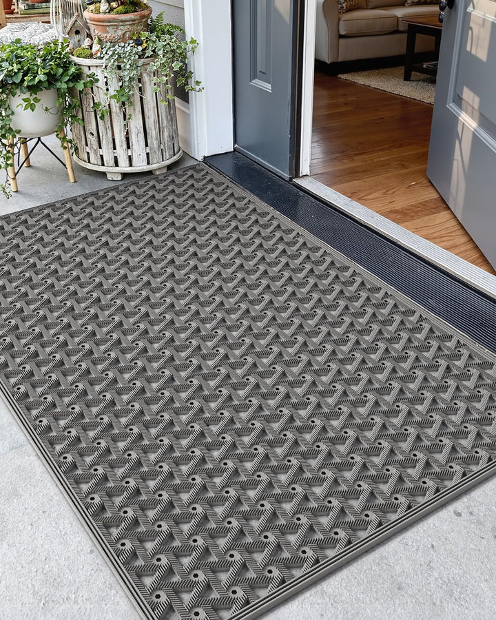 Color&Geometry door mat outside entrance with drainage traps dirt and moisture at the doorway