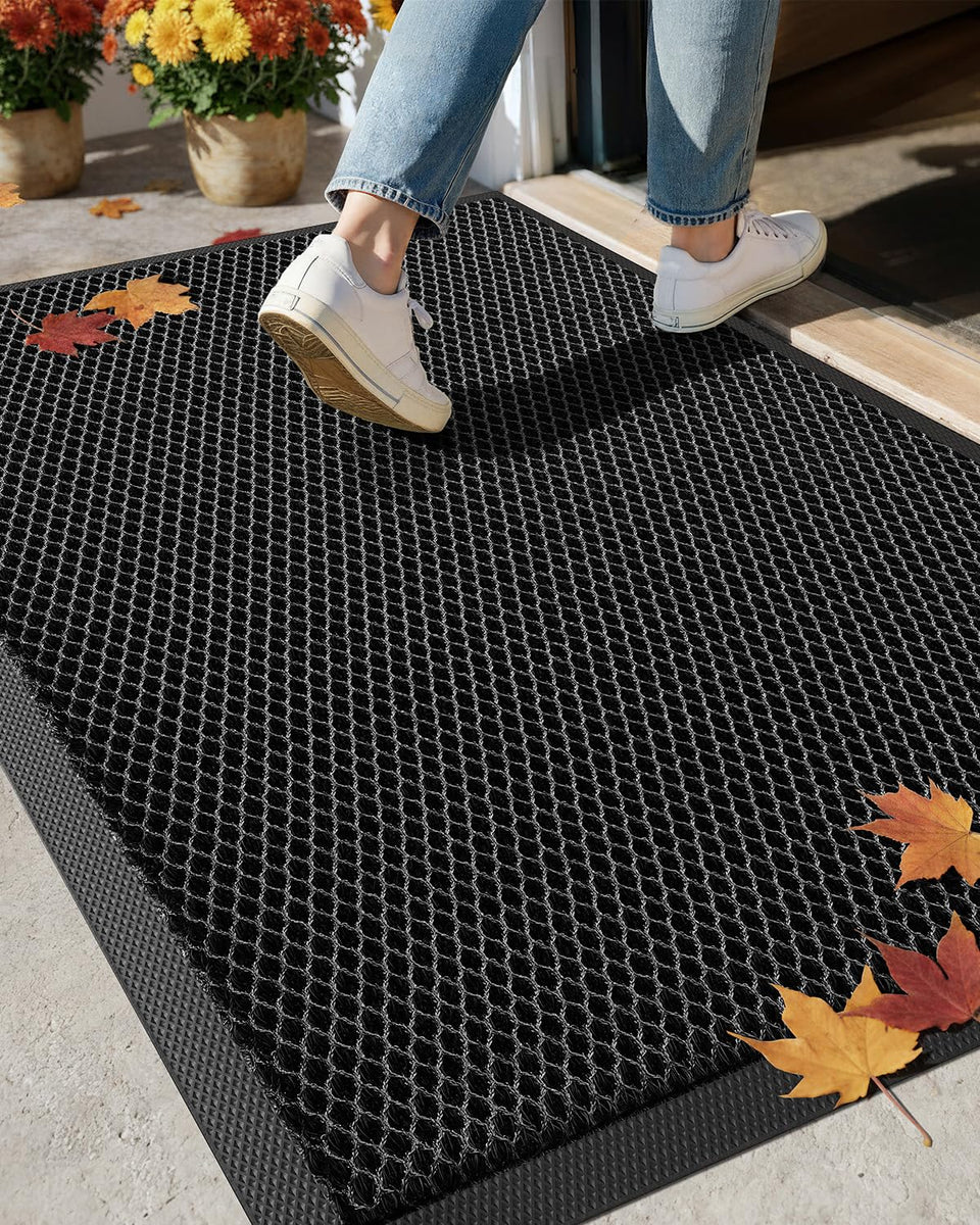 Color&Geometry high-stretch elastic silk doormat traps dirt and cushions feet at the door.