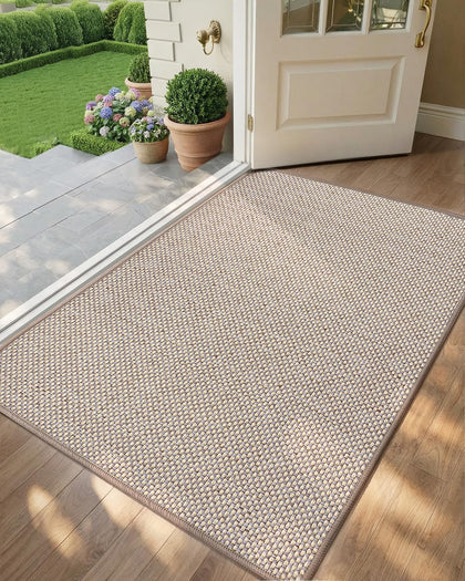 Color&Geometry Ultra-Thin Doormat rolled up for easy storage and setup.