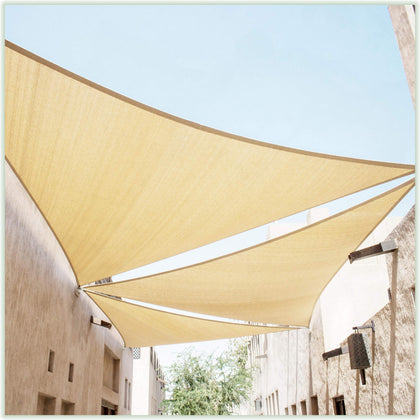 ColourTree beige triangle shade sail installed over a patio for UV protection and cooling