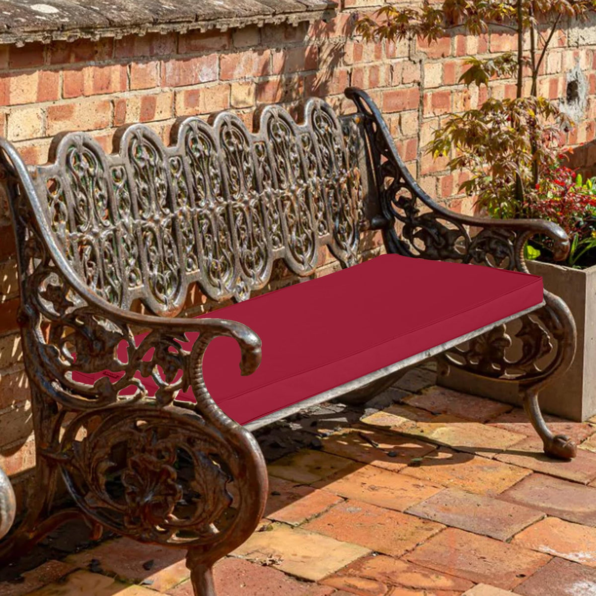 Comcaver burgundy seat pad with boxed piping maintains shape.