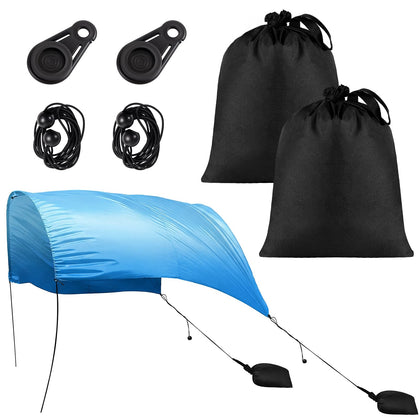 ComfyKit beach shade sandbag left stabilizes Shibumi canopy for breezy beach days.