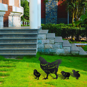 Comidox hen and chicks silhouette yard art creates whimsy in flower beds.