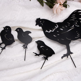 Comidox outdoor chicken statues decorate patios with rustic silhouette appeal.