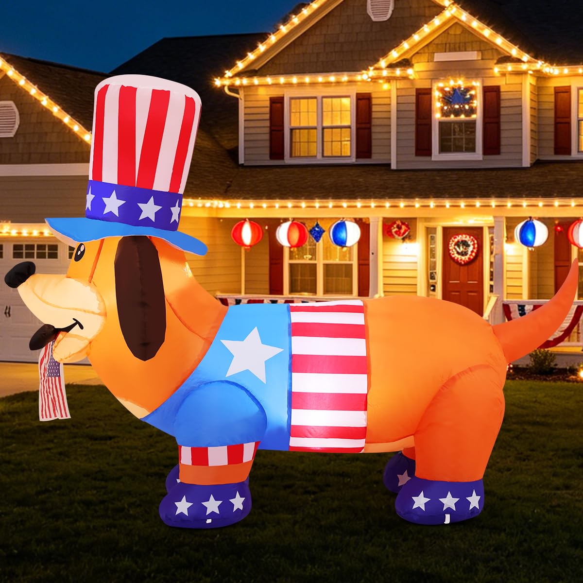 COMIN bite-the-flag inflatable dog in yard with LEDs for nighttime visibility.