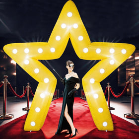 Conderyang 10ft star inflatable arch with LED lighting for outdoor events.