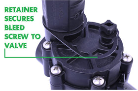 Contractor Rain Bird bleed screw retainer keeps components secure during irrigation maintenance.