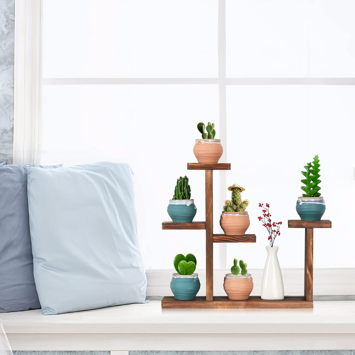 COOGOU compact footprint stand fits on a desk or windowsill.