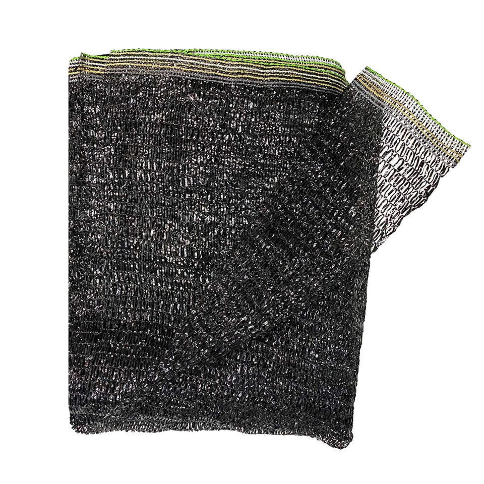 Cool Area shade cloth blocks 40% of sun while shading a garden fence