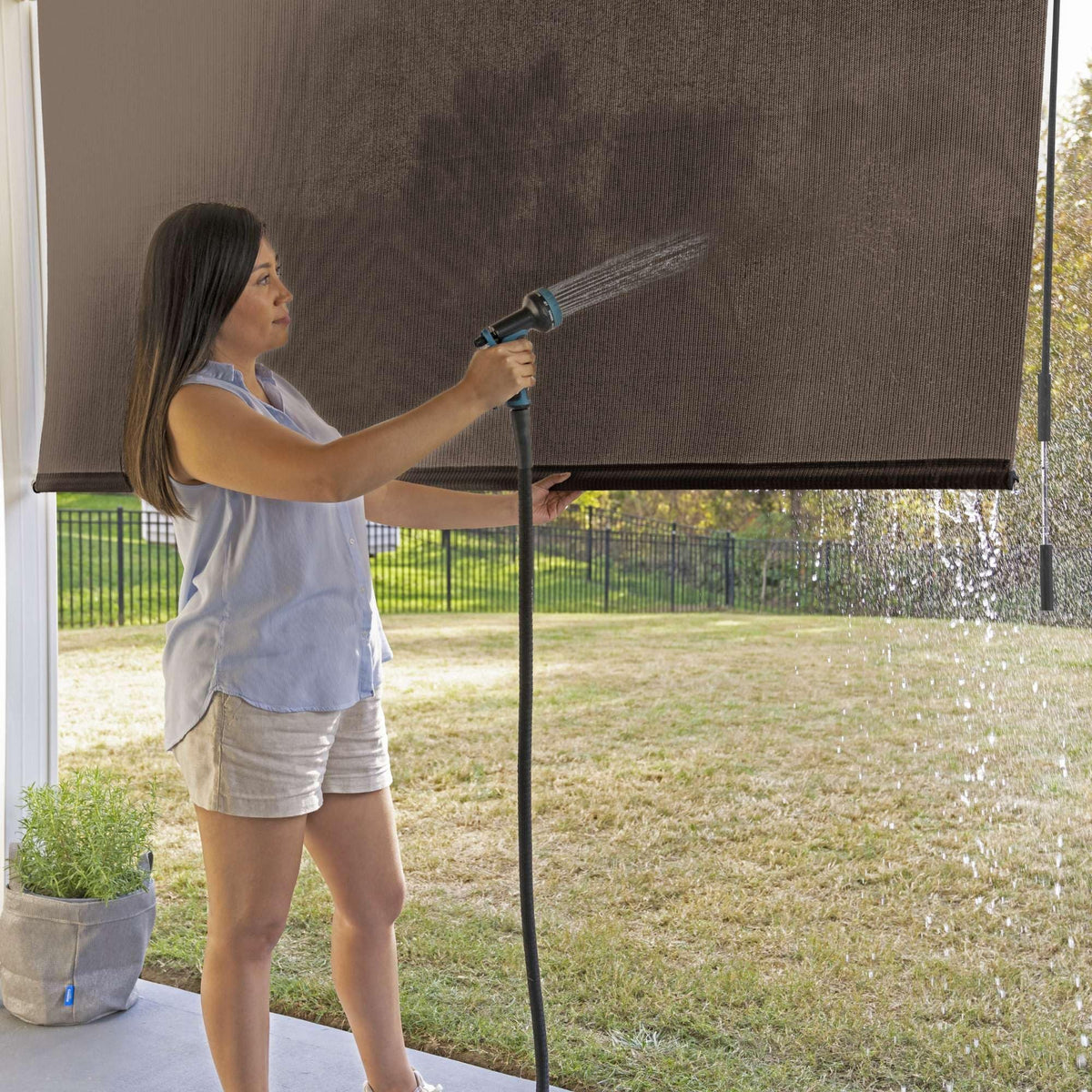 Coolaroo fade-resistant fabric sample showing vibrant color retention in sun.