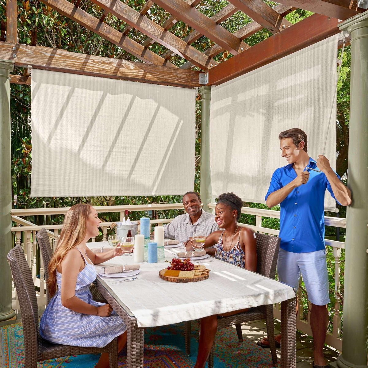 Coolaroo outdoor roller shade with wand demonstrates cord-free operation for easy privacy and shade.