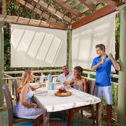 Coolaroo outdoor roller shade with wand demonstrates cord-free operation for easy privacy and shade.