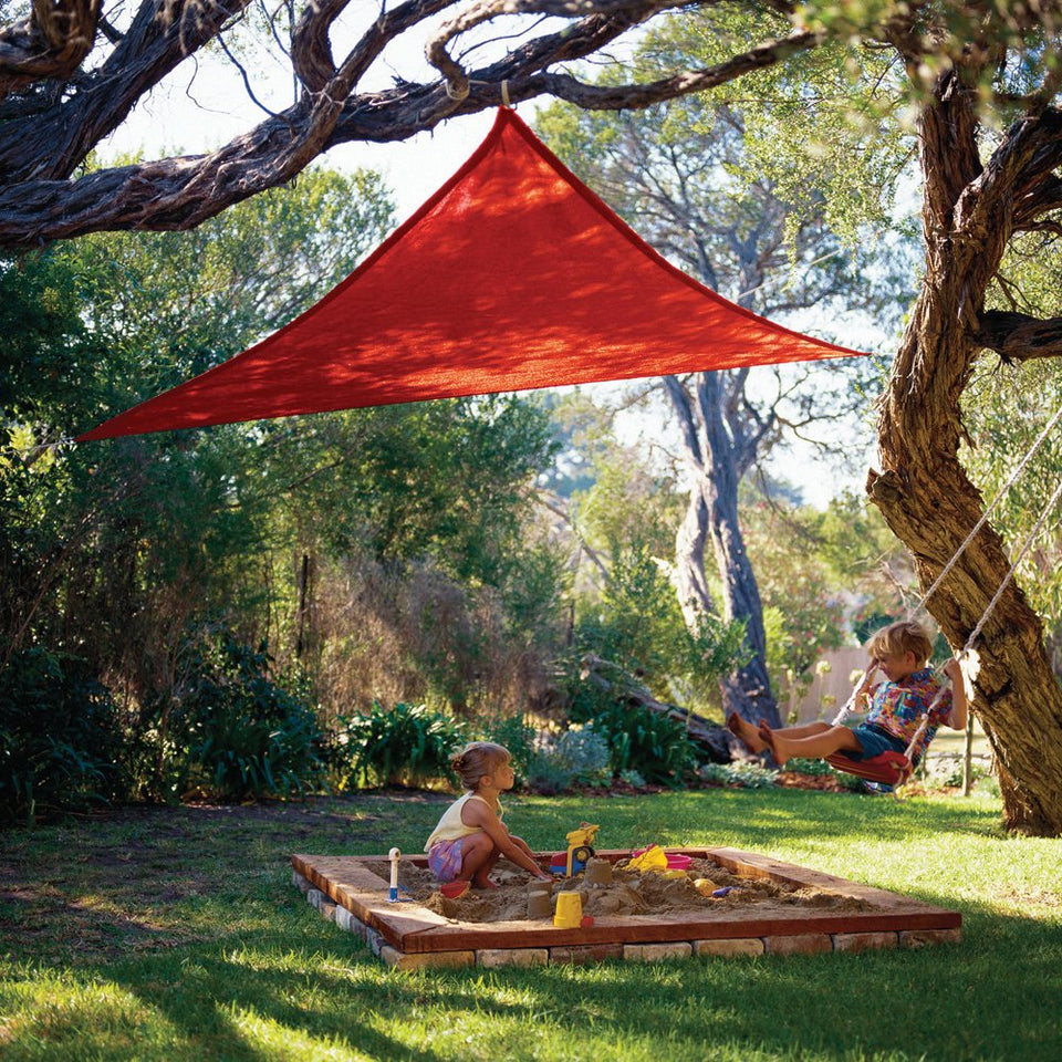 Coolaroo Party Shade Sail triangle in red with easy setup using ropes for outdoor shade