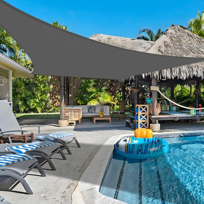 COOLBOYS sun shade sail sixteen-by-twenty in dark grey over a patio for UV protection and comfort