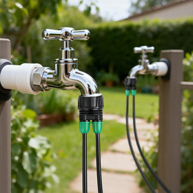 Copadri adapter showing 1/4 inch drip tubing attached to a standard faucet.