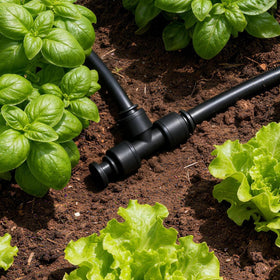 Copadri irrigation system installation scene with easy plug insertion for clean setup.