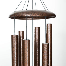 Corinthian Bells copper vein wind chime striker system closeup demonstrates precise, lasting resonance.