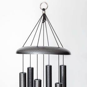 Corinthian Bells outdoor decor in sky blue adds charm to porch