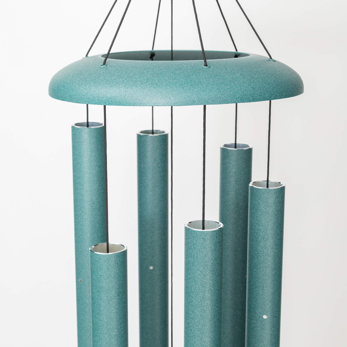 Corinthian Bells patina green finish blends beautifully with garden landscapes.