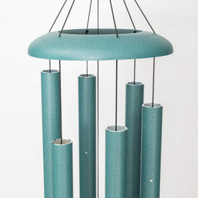 Corinthian Bells patina green finish blends beautifully with garden landscapes.