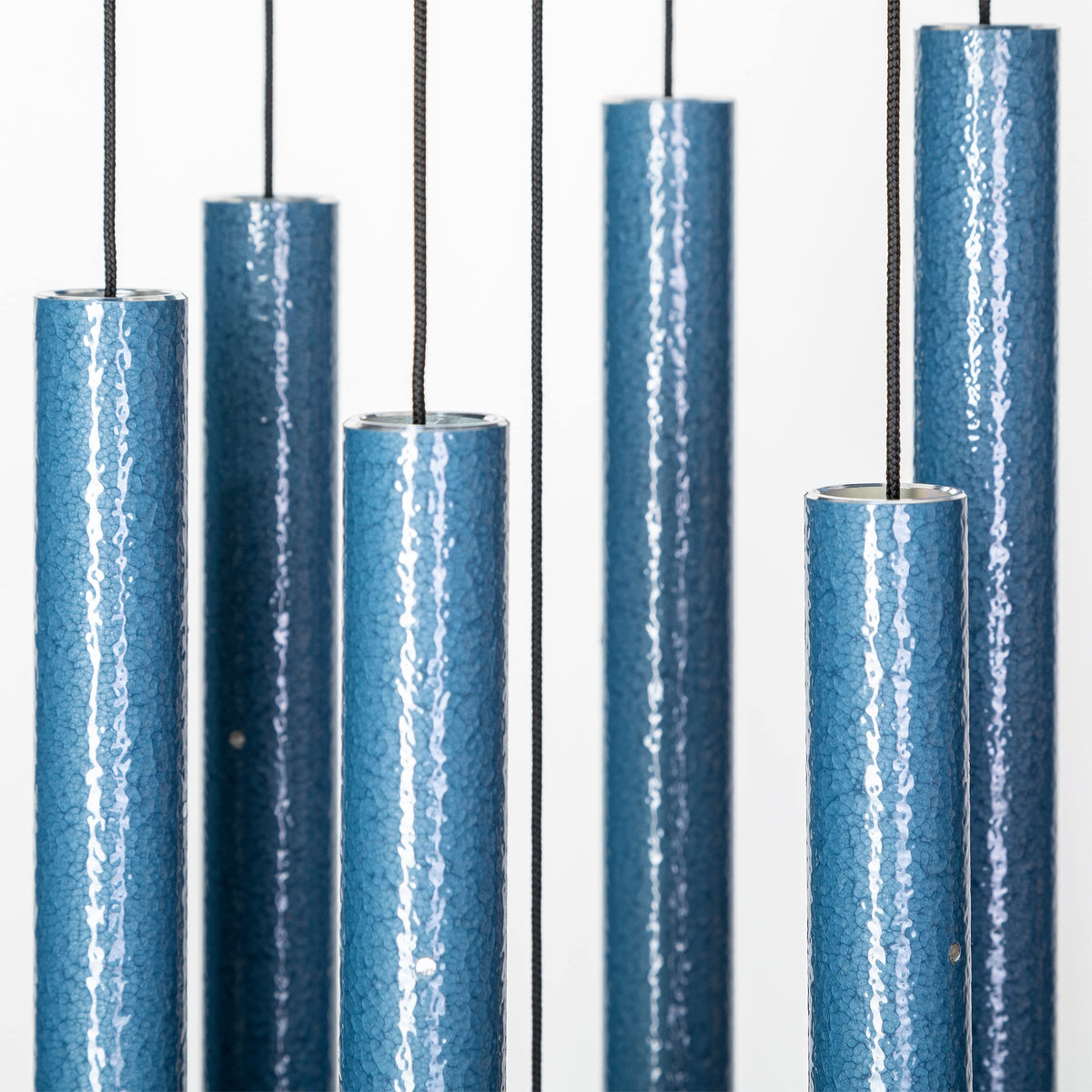 Corinthian Bells Sky Blue wind chime in backyard for relaxing tones.