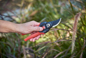 Corona Clipper bypass pruner nonstick blade enables smooth cuts.