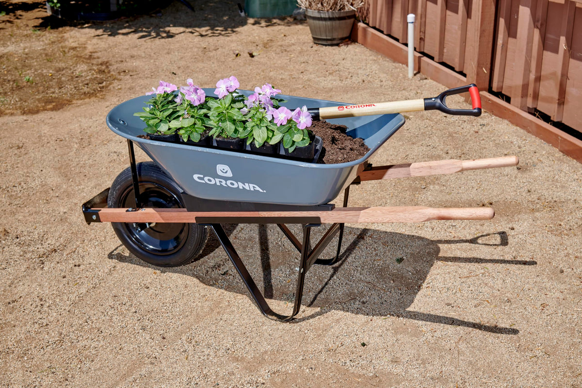 Corona Tools wheelbarrow with large 5 cubic foot tray for heavy loads.