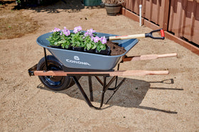 Corona Tools wheelbarrow with large 5 cubic foot tray for heavy loads.