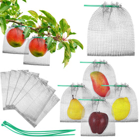 Cosblank stainless steel mesh fruit protection bag shielding peaches from birds on a tree.