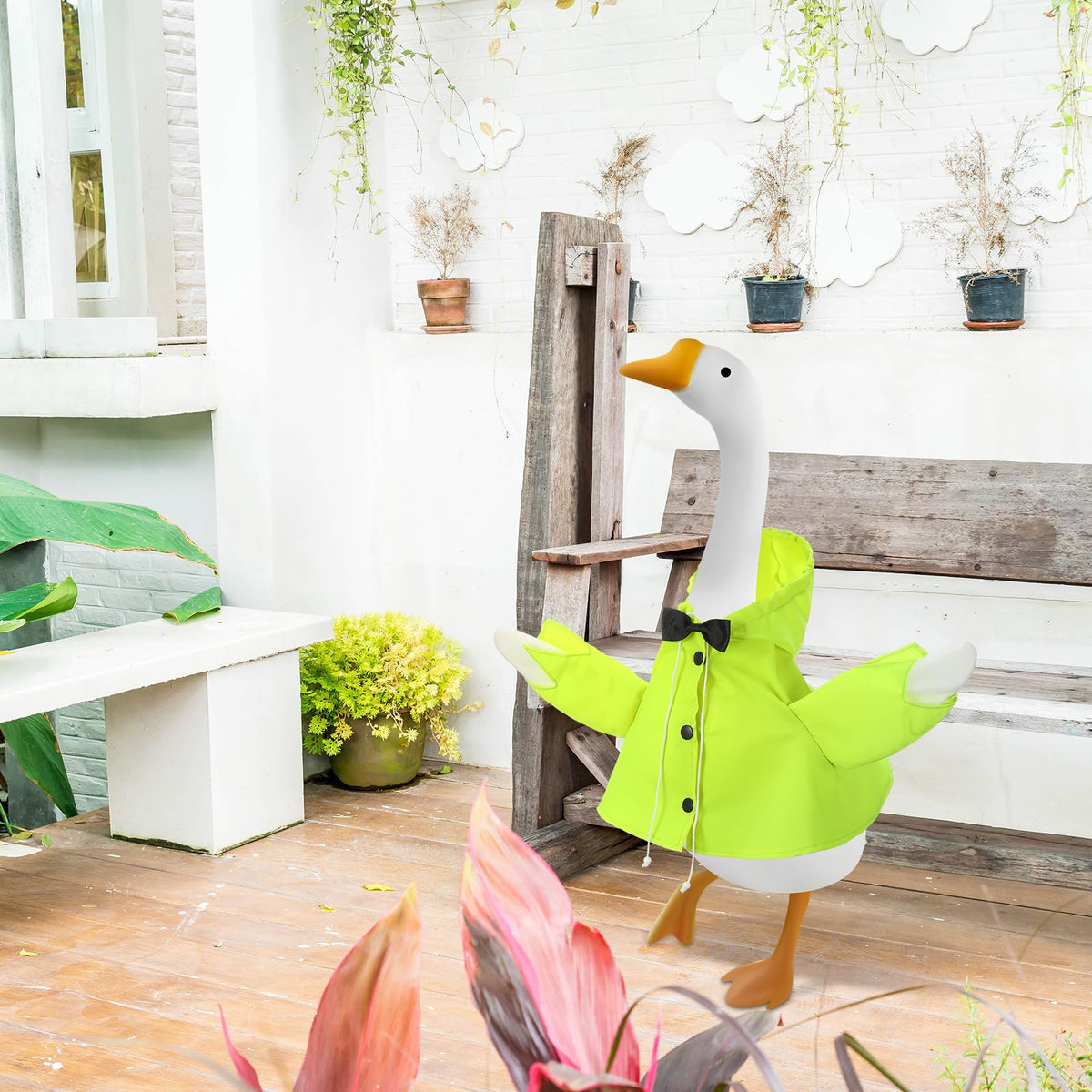 Cosblank raincoat fabric withstands weather while keeping colors vivid on goose statue.