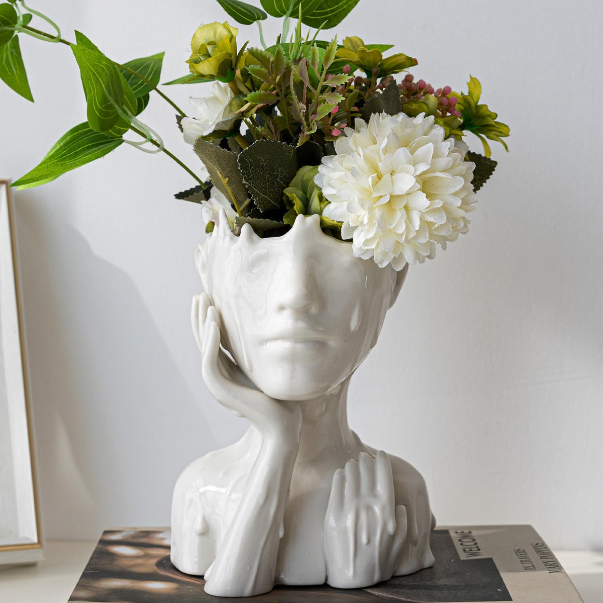 COTYNI white ceramic face planter presented as a thoughtful gift