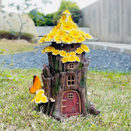 COWOS Solar Fairy House front view with warm garden glow.