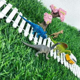 CozyCove yard decor fence adds charm to planters.