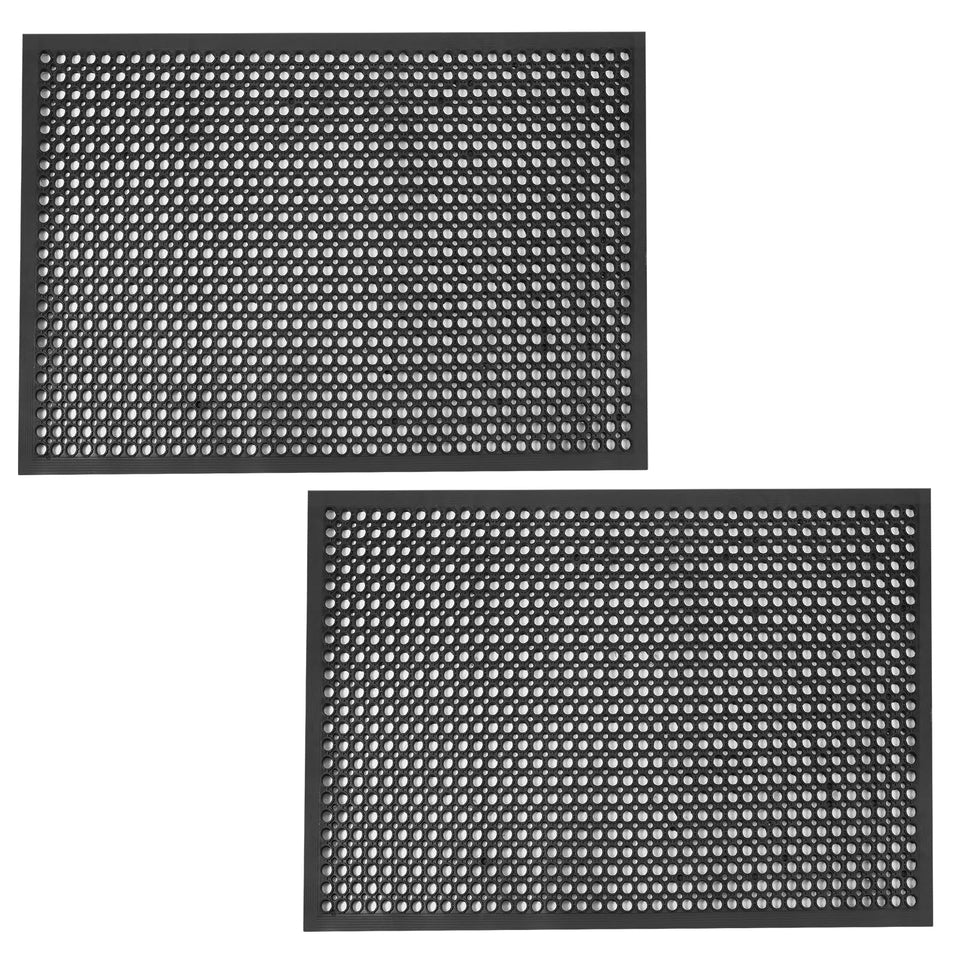 Crablux anti-fatigue outdoor mat with drainage holes for drier floors.