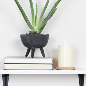 Three-legged terracotta planter adds Nordic charm to shelves and desks.